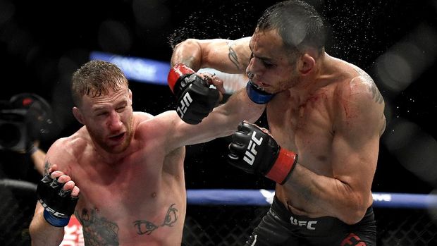 JACKSONVILLE, FLORIDA - MAY 09: Justin Gaethje (L) of the United States punches Tony Ferguson (R) of the United States in their Interim lightweight title fight during UFC 249 at VyStar Veterans Memorial Arena on May 09, 2020 in Jacksonville, Florida. Douglas P. DeFelice/Getty Images/AFP