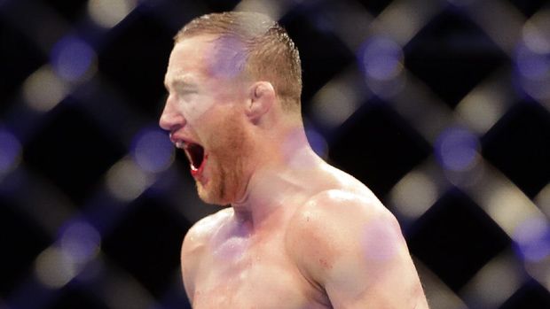 Justin Gaethje celebrates after winning his match against Tony Ferguson in a UFC 249 mixed martial arts bout, early Sunday, May 10, 2020, in Jacksonville, Fla. (AP Photo/John Raoux)