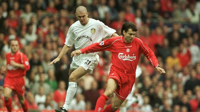 13 Oct 2001:  Dominic Matteo of Leeds clashes with Jari Litmanen of Liverpool during the Liverpool v Leeds United FA Barclaycard Premiership match at Anfield, Liverpool. Mandatory Credit: Shaun Botterill/ALLSPORT