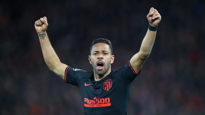 LIVERPOOL, ENGLAND - MARCH 11: Renan Lodi of Atletico Madrid celebrates his sides second goal during the UEFA Champions League round of 16 second leg match between Liverpool FC and Atletico Madrid at Anfield on March 11, 2020 in Liverpool, United Kingdom.  (Photo by Julian Finney/Getty Images)