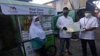 Bank Mega Syariah Bagikan 100.000 Makanan