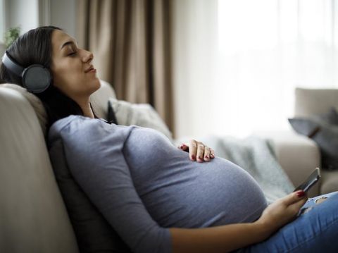 Woman enjoying pregnancy