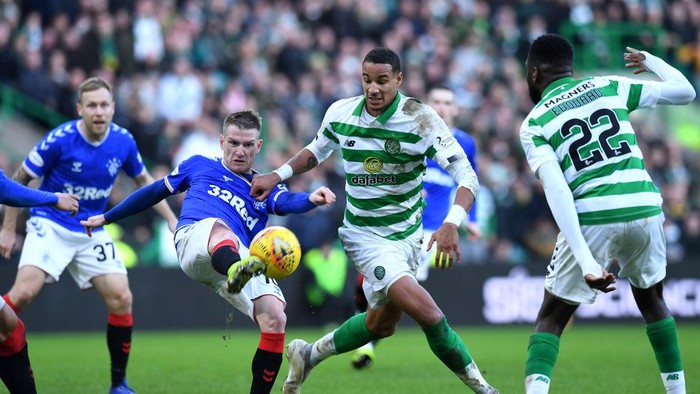 GLASGOW, SCOTLAND - DECEMBER 29:  Steven Davis of Rangers and Christopher Jullien of Celtic challenge for the ball during the Ladbrokes Premiership match between Celtic and Rangers at Celtic Park on December 29, 2019 in Glasgow, Scotland.(Photo by Mark Runnacles/Getty Images)