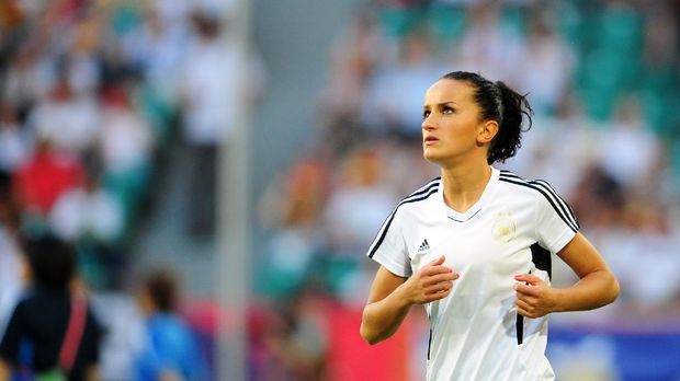 Germany's midfielder Fatmire Bajramaj is pictured prior to the quarter-final match of the FIFA women's football World Cup Germany vs Japan on July 9, 2011 in Wolfsburg, northern Germany. Japan won the match 0-1. AFP PHOTO / JOHANNES EISELE (Photo by JOHANNES EISELE / AFP)