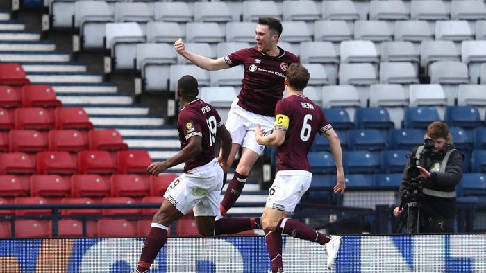 Hearts of Midlothian GLASGOW, SCOTLAND - APRIL 13: John Souttar of Heart of Midlothian F.C. celebrates after scoring his teams second goal with Uche Ikpeazu of of Heart of Midlothian F.C. and Christophe Berra of Heart of Midlothian F.C. during the Scottish Cup Semi Final match between Heart of Midlothian and Inverness Caledonian Thistle at Hampden Park on April 13, 2019 in Glasgow, Scotland. (Photo by Ian MacNicol/Getty Images)