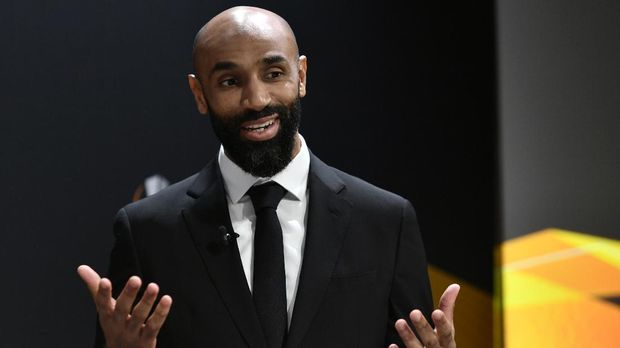 UEFA Europa League ambassador Frederic Kanoute arrives to take part in the UEFA Europa League football cup round of 32 draw ceremony on December 16, 2019 in Nyon. (Photo by Fabrice COFFRINI / AFP)