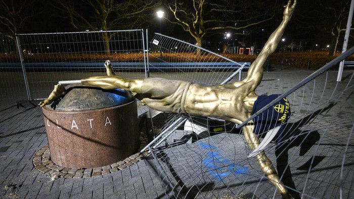 FILE - In this Sunday Jan. 5, 2020 file photo, the damaged statue of soccer player Zlatan Ibrahimovic next to Stadion football arena in Malmo, Sweden.  Media reports say the city of Malmo has had enough of repeated acts of vandalism on Swedish soccer star Zlatan Ibrahimovic’s statue outside the local football club’s stadium and is set to move it to a new location. The Sydsvenskan newspaper said the municipal council in Sweden’s third largest city is poised to make a decision on Monday, May 17, 2020 and is seeking suggestions from top-flight team Malmo FF as to where the statue should be moved later in the year.(Johan Nilsson/TT via AP, file)