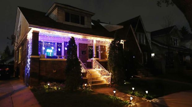 FILE- In a file photo from Tuesday, April 28, 2020, Ramadan lights are displayed on a house in Dearborn, Mich. The Muslim community in Dearborn is starting a new tradition this year. The community is hosting a Ramadan lights competition in hopes of spreading joy and bringing back some of the holiday spirit during the coronavirus pandemic. (AP Photo/Carlos Osorio, File)