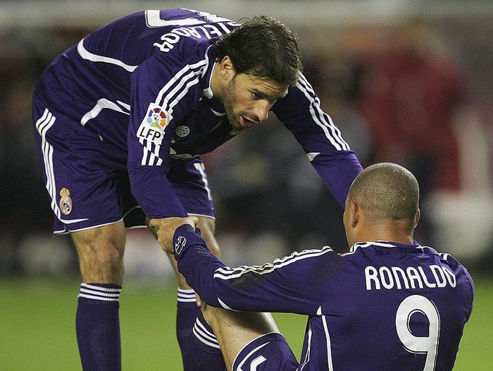 SEVILLE, SPAIN - DECEMBER 09: Ruud van Nistelrooy of Real Madrid checks-up on Ronaldo after he was injured during the Primera Liga match between Sevilla and Real Madrid at the Sanchez Pizjuan stadium on December 9, 2006 in Seville, Spain.  (Photo by Denis Doyle/Getty Images)