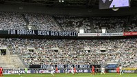 Para suporter kardus itu dipasang untuk meramaikan stadion yang tertutup buat penonton. (Foto: Ina Fassbender/Pool via Getty Im/Pool)