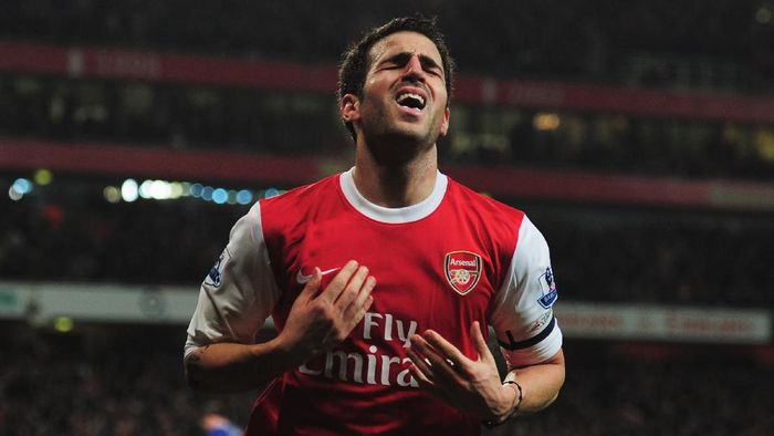Fabregas LONDON, ENGLAND - JANUARY 25: Cesc Fabregas of Arsenal celebrates as he scores their third goal during the Carling Cup Semi Final Second Leg match between Arsenal and Ipswich Town at Emirates Stadium on January 25, 2011 in London, England. (Photo by Shaun Botterill/Getty Images)