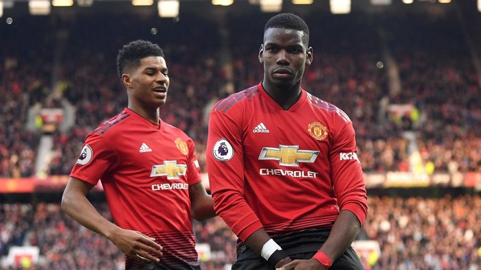 MANCHESTER, ENGLAND - APRIL 13:  Paul Pogba of Manchester United celebrates after scoring his teams second goal from a penalty with team mate Marcus Rashford during the Premier League match between Manchester United and West Ham United at Old Trafford on April 13, 2019 in Manchester, United Kingdom. (Photo by Michael Regan/Getty Images)