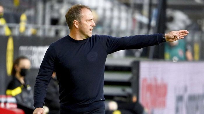 Hansi Flick Munichs head coach Hansi Flick gestures during the German Bundesliga soccer match between Borussia Dortmund and FC Bayern Munich in Dortmund, Germany, Tuesday, May 26, 2020. The German Bundesliga is the worlds first major soccer league to resume after a two-month suspension because of the coronavirus pandemic. (Federico Gambarini/DPA via AP, Pool)