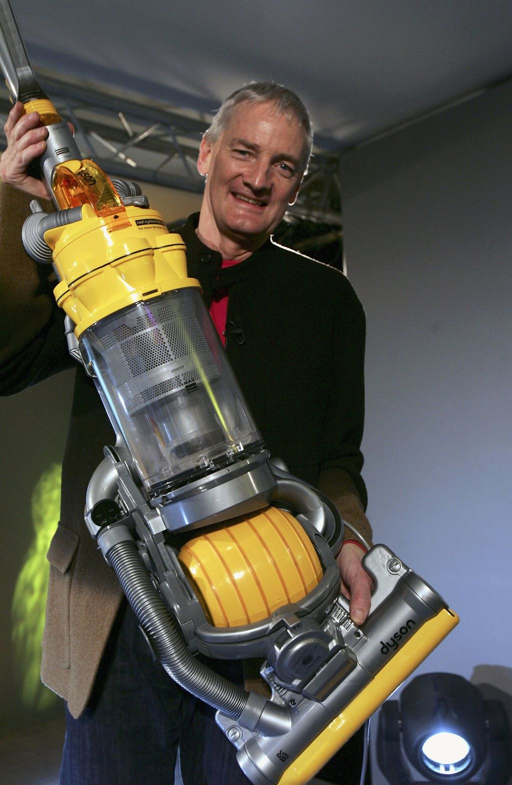 LONDON - MARCH 14:  Inventor James Dyson is seen at the launch of his latest hoovering invention on March 14, 2005 in London.  The vaccum cleaner replaces the traditional four wheels with one ball to guide it across the floor giving it increased maneouverability.  (Photo by Bruno Vincent/Getty Images)