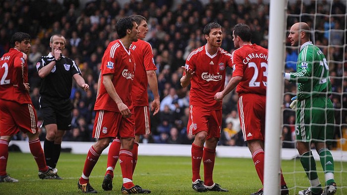 WEST BROMWICH, UNITED KINGDOM - MAY 17:  Jamie Carragher of Liverpool is calmed down by his team mates following an altercation with team mate Alvaro Arbeloa during the Barclays Premier League match between West Bromwich Albion and Liverpool at The Hawthorns on May 17, 2009 in West Bromwich, England. (Photo by Shaun Botterill/Getty Images)