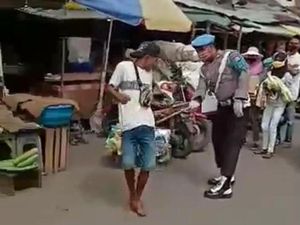 Polisi yang Viral Pecut Warga Tak Bermasker Ditahan Propam Polda Maluku