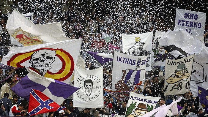 MADRID, SPAIN - MARCH 20: Real Madrids radical Ultra Sur soccer fans wave banners before a Primera Liga soccer match on March 20, 2005 between Real Madrid and Malaga at the Bernabeu in Madrid, Spain. (Photo by Denis Doyle/Getty Images)