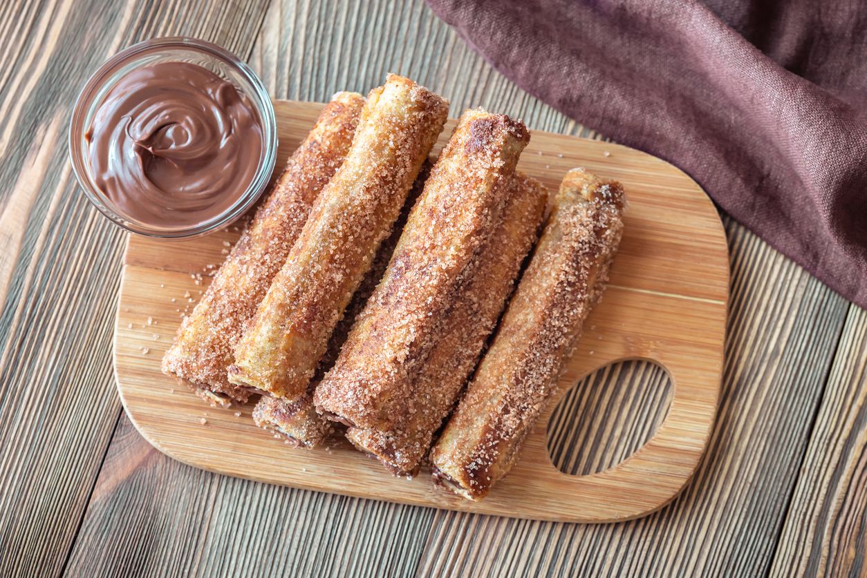 French toast roll-ups on the wooden board