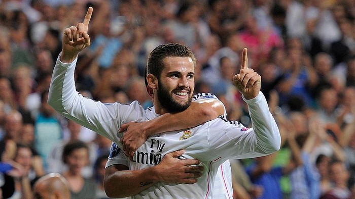 MADRID, SPAIN - SEPTEMBER 16:  Nacho Fernandez of Real Madrid celebrates after scoring Reals opening goal during the UEFA Champions League Group B match between Real Madrid CF and FC Basel 1893 on September 16, 2014 in Madrid, Spain.  (Photo by Denis Doyle/Getty Images)