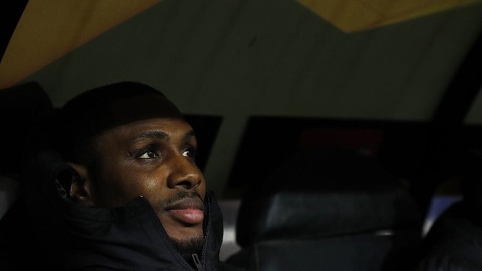 Manchester Uniteds Nigerian striker Odion Ighalo looks on from the dugout ahead of the UEFA Europa League round of 32 first leg, football match between Club Brugges and Manchester United, at the Jan Breydel Stadium in Bruges on February 20, 2020. (Photo by ADRIAN DENNIS / AFP)