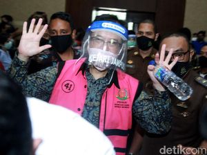 Membaca Arti Senyum Para Koruptor