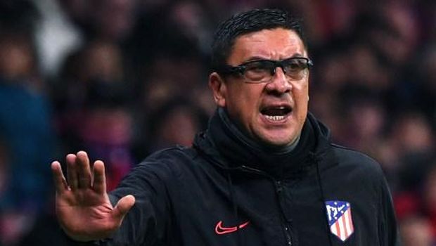 (FILES) In this file photo taken on February 19, 2019 Atletico Madrid's Argentinian coach Diego Simeone (R) and Argentinian assistant coach German 