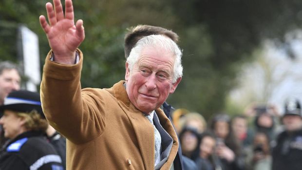 FILE - In this Tuesday, Feb. 18, 2020 file photo, Britain's Prince Charles greets members of the public as he leaves the RSC or Royal Shakespeare Company, in Stratford-upon-Avon, England, during his tour of Warwickshire and the West Midlands. Prince Charles in a interview with Sky News on Thursday June 4, 2020, said he missed giving his family members a hug during the long weeks of lockdown due to the COVID-19 outbreak, and also acknowledged that he had not seen his father, Prince Philip, for many weeks. (Jacob King/Pool Photo via AP, File)