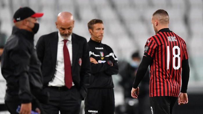 TURIN, ITALY - JUNE 12:  Ante Rebic of AC Milan walks off the pitch after being sent off during the Coppa Italia Semi-Final Second Leg match between Juventus and AC Milan at Allianz Stadium on June 12, 2020 in Turin, Italy.  (Photo by Valerio Pennicino/Getty Images)