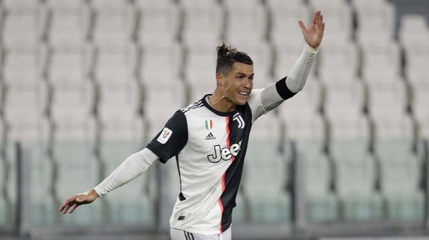 Juventus' Cristiano Ronaldo reacts during an Italian Cup second leg soccer match between Juventus and AC Milan at the Allianz stadium, in Turin, Italy, Friday, June 12, 2020. The match was being played without spectators because of the coronavirus lockdown. (AP Photo/Luca Bruno)