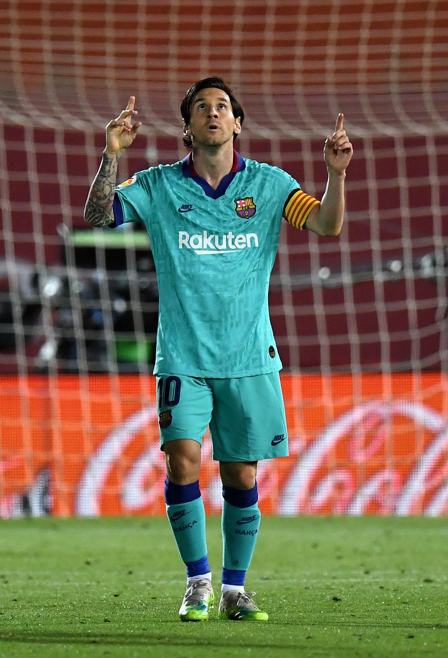 MALLORCA, SPAIN - JUNE 13: Lionel Messi of FC Barcelona celebrates  after scoring his sides fourth goal during the La Liga match between RCD Mallorca and FC Barcelona at Estadio de Son Moix on June 13, 2020 in Mallorca, Spain. (Photo by David Ramos/Getty Images)