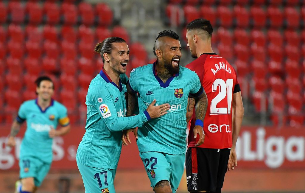 MALLORCA, SPAIN - JUNE 13: Arturo Vidal of FC Barcelona celebrates after scoring his team's first goal with Antoine Griezmann of FC Barcelona during the La Liga match between RCD Mallorca and FC Barcelona at Estadio de Son Moix on June 13, 2020 in Mallorca, Spain. (Photo by David Ramos/Getty Images)