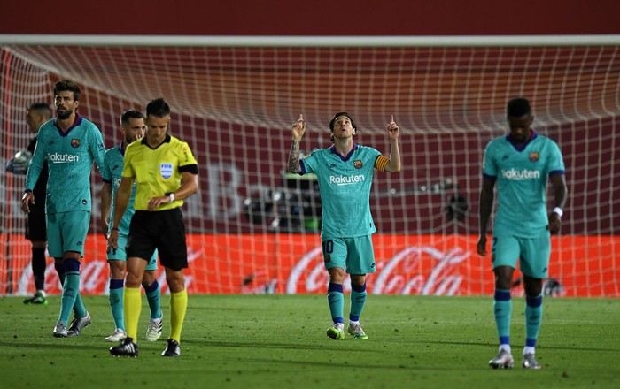 MALLORCA, SPAIN - JUNE 13: Lionel Messi of FC Barcelona celebrates  after scoring his sides fourth goal during the La Liga match between RCD Mallorca and FC Barcelona at Estadio de Son Moix on June 13, 2020 in Mallorca, Spain. (Photo by David Ramos/Getty Images)