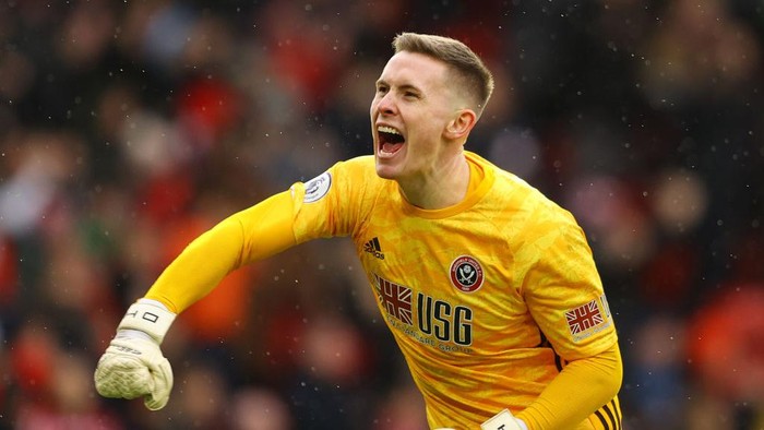 SHEFFIELD, ENGLAND - FEBRUARY 22: Dean Henderson of Sheffield United celebrates his sides first goal during the Premier League match between Sheffield United and Brighton & Hove Albion at Bramall Lane on February 22, 2020 in Sheffield, United Kingdom. (Photo by Richard Heathcote/Getty Images)