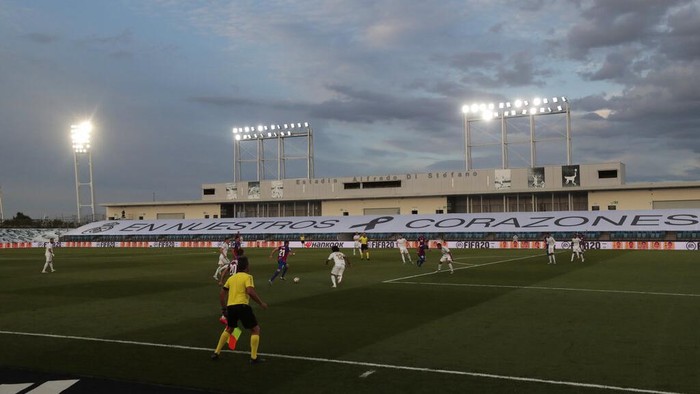 Eibars Pedro Leon goes with the ball as Real Madrids Marcelo tries to stop him during the Spanish La Liga soccer match between Real Madrid and Eibar at Alfredo di Stefano stadium in Madrid, Spain, Sunday, June 14, 2020. (AP Photo/Bernat Armangue)