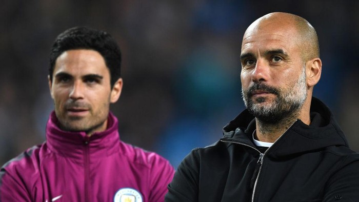 MANCHESTER, ENGLAND - MAY 09:  Mikel Arteta and Josep Guardiola, Manager of Manchester City  looks on during the Premier League match between Manchester City and Brighton and Hove Albion at Etihad Stadium on May 9, 2018 in Manchester, England.  (Photo by Gareth Copley/Getty Images)