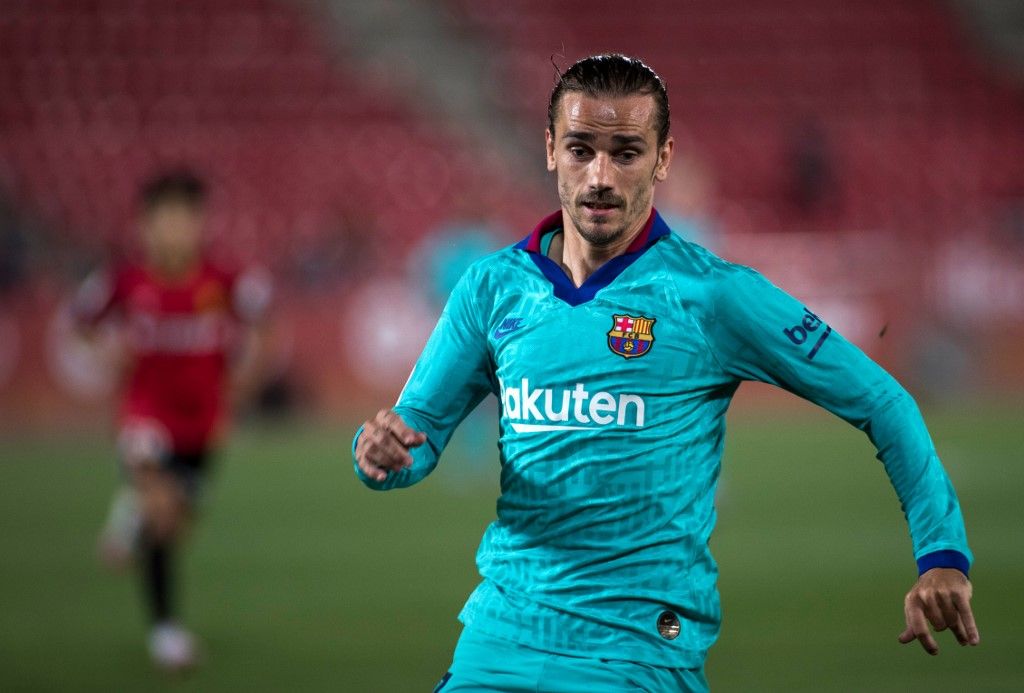 Barcelona's French forward Antoine Griezmann runs during the Spanish League football match between RCD Mallorca and FC Barcelona at the Visit Mallorca stadium (Son Moix stadium) in Palma de Mallorca on June 13, 2020. (Photo by JAIME REINA / AFP)