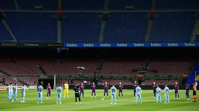 FC Barcelonas Antoine Griezmann, second left, celebrates after scoring his sides second goal during the Spanish La Liga soccer match between FC Barcelona and Leganes at the Camp Nou stadium in Barcelona, Spain, Tuesday, June 16, 2020. (AP Photo/Joan Montfort)