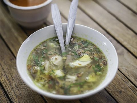 Soto is a traditional Indonesian soup mainly composed of broth, chicken and vegetables.