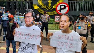 Aksi Kamisan Berpayung Hitam di Depan KPK-Kejagung