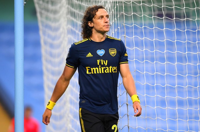 MANCHESTER, ENGLAND - JUNE 17: David Luiz of Arsenal walks along the touchline after being sent off during the Premier League match between Manchester City and Arsenal FC at Etihad Stadium on June 17, 2020 in Manchester, United Kingdom. (Photo by Laurence Griffiths/Getty Images)