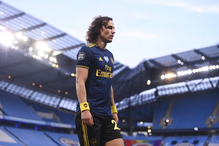 David Luiz Arsenals David Luiz leaves the field after getting a red card during the English Premier League soccer match between Manchester City and Arsenal at the Etihad Stadium in Manchester, England, Wednesday, June 17, 2020. The English Premier League resumes Wednesday after its three-month suspension because of the coronavirus outbreak. (Laurence Griffiths/Pool via AP)