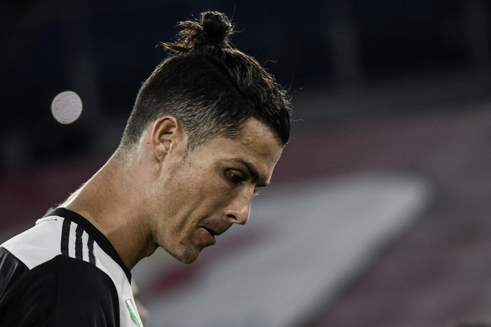 Juventus Portuguese forward Cristiano Ronaldo reacts after Juventus lost the TIM Italian Cup (Coppa Italia) final football match Napoli vs Juventus on June 17, 2020 at the Olympic stadium in Rome, played behind closed doors as the country gradually eases the lockdown aimed at curbing the spread of the COVID-19 infection, caused by the novel coronavirus. (Photo by Filippo MONTEFORTE / AFP)