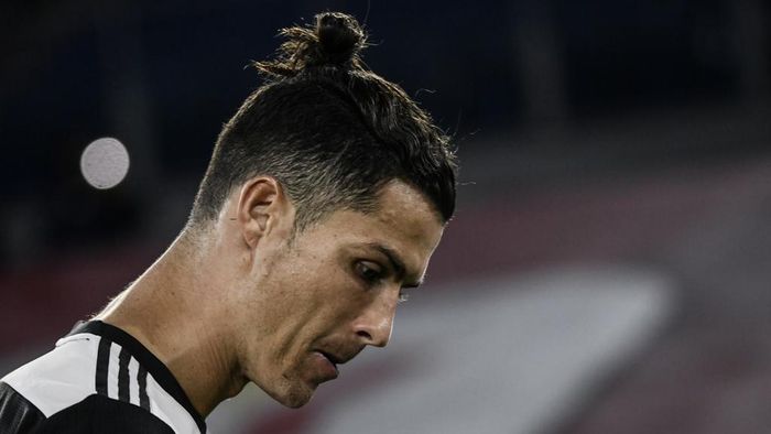 Ronaldo Juventus Portuguese forward Cristiano Ronaldo reacts after Juventus lost the TIM Italian Cup (Coppa Italia) final football match Napoli vs Juventus on June 17, 2020 at the Olympic stadium in Rome, played behind closed doors as the country gradually eases the lockdown aimed at curbing the spread of the COVID-19 infection, caused by the novel coronavirus. (Photo by Filippo MONTEFORTE / AFP)
