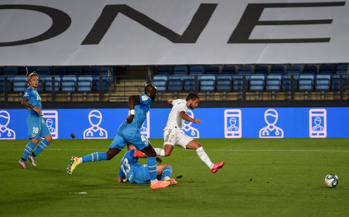 Eden Hazard MADRID, SPAIN - JUNE 18: Eden Hazard of Real Madrid CF shoots unsuccessfully at goal during the Liga match between Real Madrid CF and Valencia CF at Estadio Alfredo Di Stefano on June 18, 2020 in Madrid, Spain. (Photo by Denis Doyle/Getty Images)