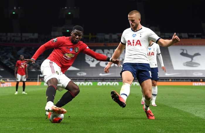 LONDON, ENGLAND - JUNE 19: Paul Pogba of Manchester United is challenged by Eric Dier of Tottenham Hotspur during the Premier League match between Tottenham Hotspur and Manchester United at Tottenham Hotspur Stadium on June 19, 2020 in London, England. (Photo by Shaun Botterill/Getty Images)