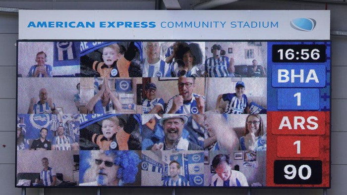 BRIGHTON, ENGLAND - JUNE 20: The Fan Came react to Brighton and Hove Albion scoring their second goal during the Premier League match between Brighton & Hove Albion and Arsenal FC at American Express Community Stadium on June 20, 2020 in Brighton, England. Football Stadiums around Europe remain empty due to the Coronavirus Pandemic as Government social distancing laws prohibit fans inside venues resulting in all fixtures being played behind closed doors. (Photo by Richard Heathcote/Getty Images)