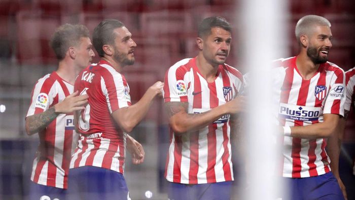 Atletico Madrid MADRID, SPAIN - JUNE 20: Vitolo of Atletico Madrid celebrates with teammates after scoring his teams first goal during the La Liga match between Club Atletico de Madrid and Real Valladolid CF at Wanda Metropolitano on June 20, 2020 in Madrid, Spain. (Photo by Gonzalo Arroyo Moreno/Getty Images)