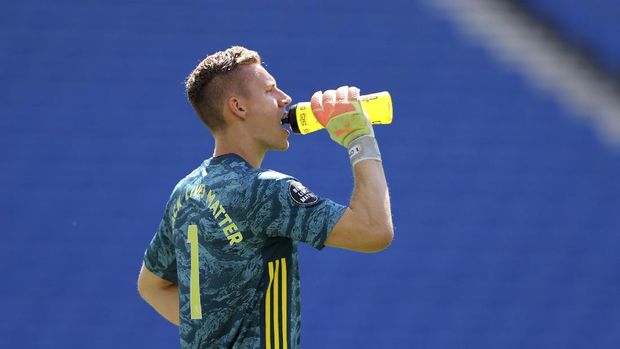 Arsenal's goalkeeper Bernd Leno takes a drink during the English Premier League soccer match between Brighton & Hove Albion and Arsenal at the AMEX Stadium in Brighton, England, Saturday, June 20, 2020. (Richard Heathcote/Pool via AP)