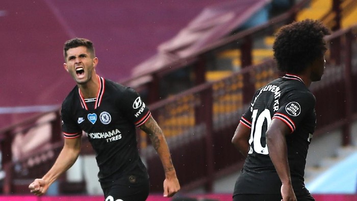 BIRMINGHAM, ENGLAND - JUNE 21: Christian Pulisic of Chelsea celebrates after scoring his teams first goal during the Premier League match between Aston Villa and Chelsea FC at Villa Park on June 21, 2020 in Birmingham, England. Football Stadiums around Europe remain empty due to the Coronavirus Pandemic as Government social distancing laws prohibit fans inside venues resulting in all fixtures being played behind closed doors. (Photo by Molly Darlington/Pool via Getty Images)
