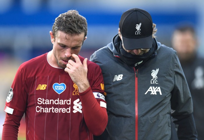 LIVERPOOL, ENGLAND - JUNE 21: Jordan Henderson of Liverpool interacts with Jurgen Klopp, Manager of Liverpool after the Premier League match between Everton FC and Liverpool FC at Goodison Park on June 21, 2020 in Liverpool, England. Football Stadiums around Europe remain empty due to the Coronavirus Pandemic as Government social distancing laws prohibit fans inside venues resulting in all fixtures being played behind closed doors. (Photo by Peter Powell/Pool via Getty Images)